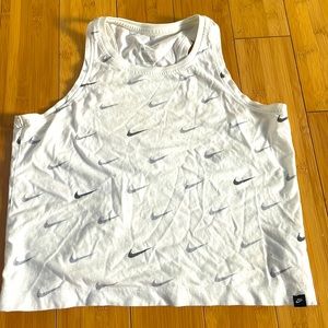 Nike tank top with grey nike check marks all over